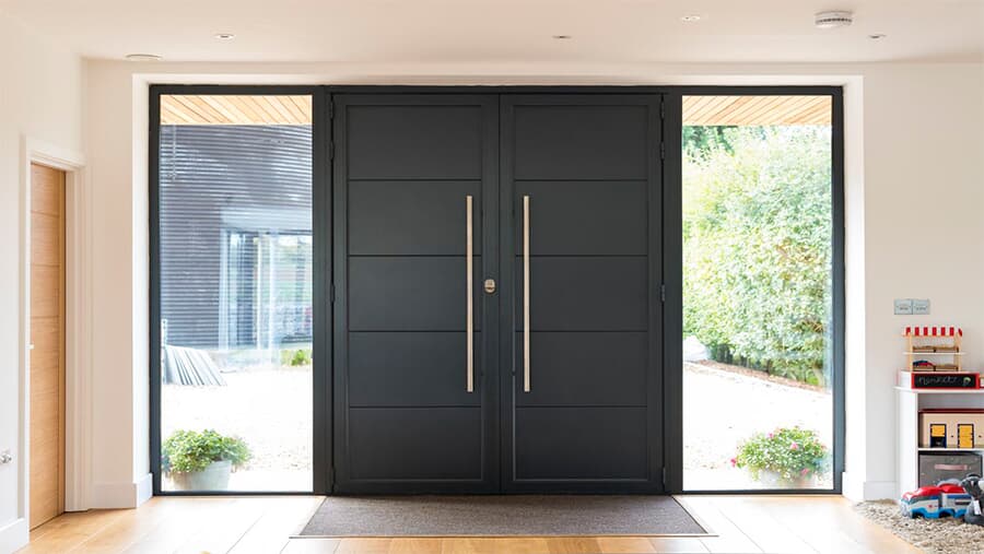 Black entry pivot door with sidelights