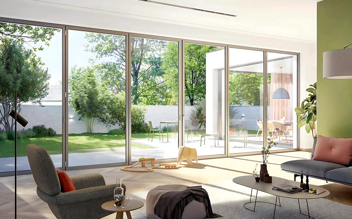 Closed ultra-slim frame glass doors in a bright living room offering unobstructed views of a sunny green garden Closed ultra-slim frame glass doors in a bright living room offering unobstructed views of a sunny green garden