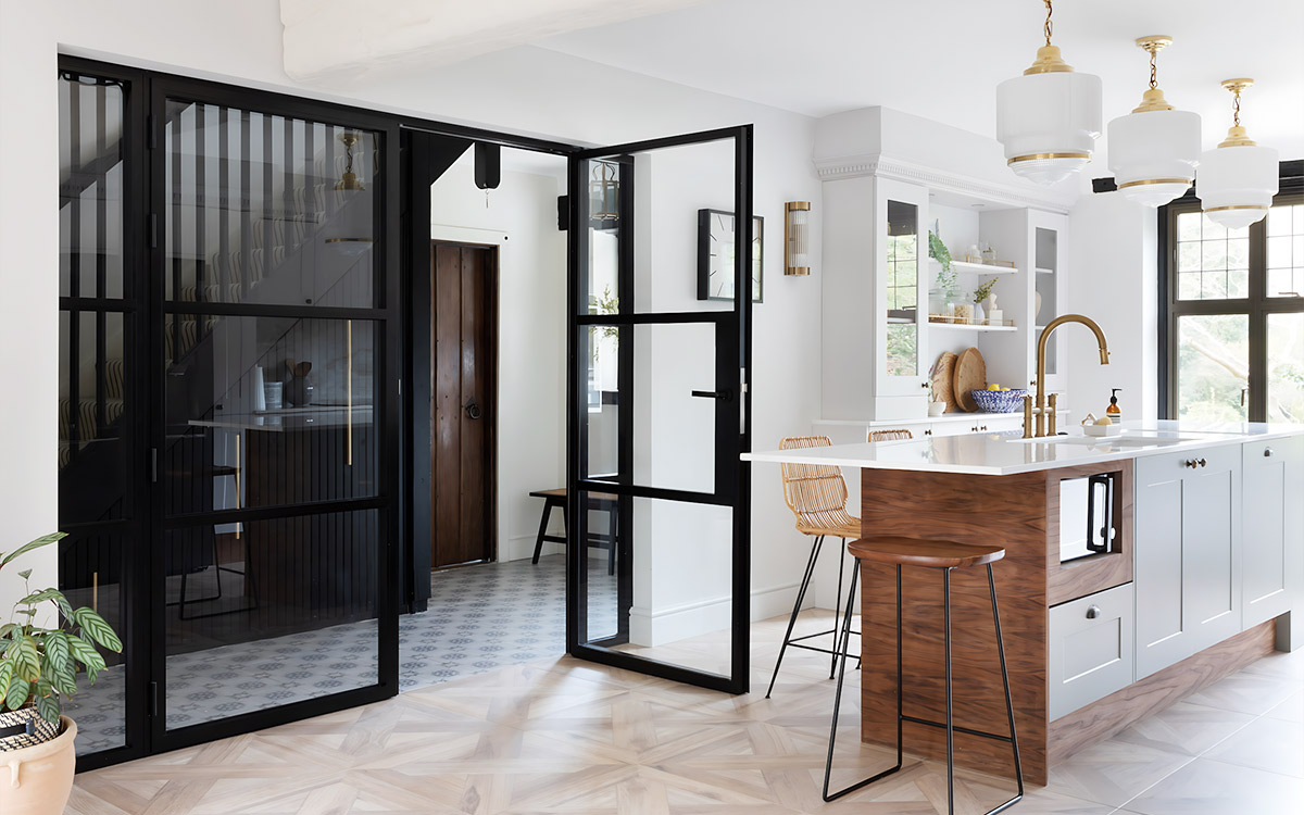 Minimalist glass office partition doors creating a modern L-shaped glass enclose for a private home workspace Minimalist glass office partition doors creating a modern L-shaped glass enclose for a private home workspace