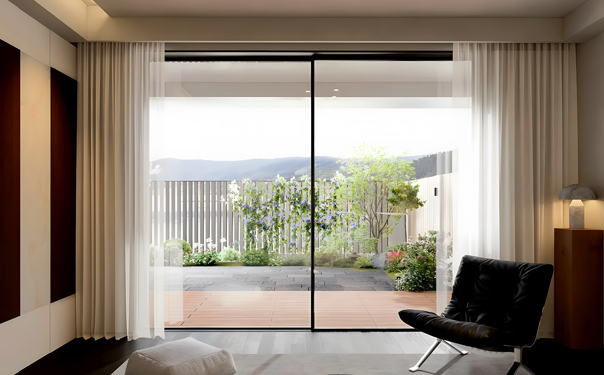 Minimal frame sliding door system installed in modern minimalist living room overlooking garden terrace Minimal frame sliding door system installed in modern minimalist living room overlooking garden terrace
